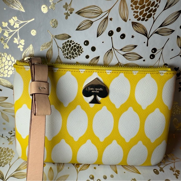 kate spade Handbags - Kate Spade Yellow and White Lemon Wristlet